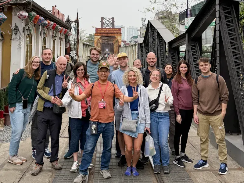 Tony T, founder of Viet Expedition, guiding travelers in Hanoi
